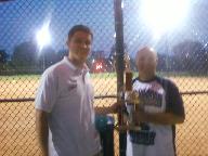 Autumn Ridge manager, Mike Harbert, receiving his trophy from Sean Supler of Mayfield Village