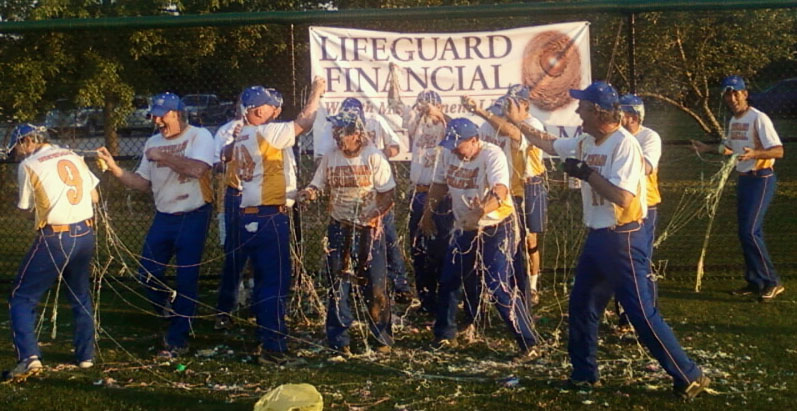 Mayfield Village 50+ Men Champs, Lifeguard Financial, celebrate with silly string after their 20-9 victory against Wright Place